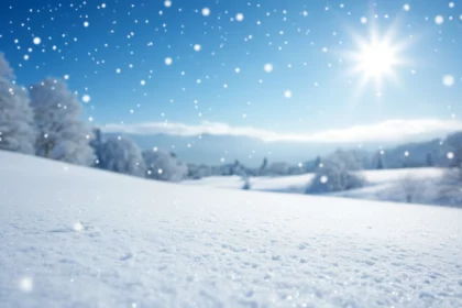 Téli táj havas földdel és csillogó napsütéssel
